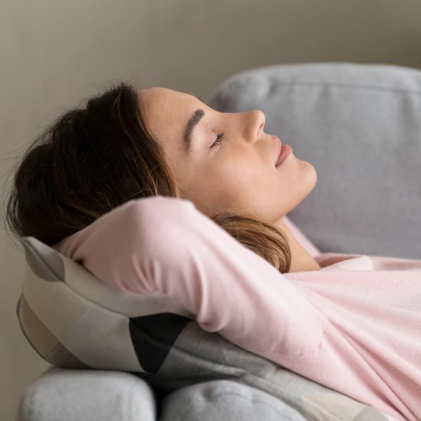 Woman resting on couch