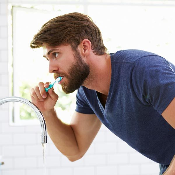Man brushing his teeth